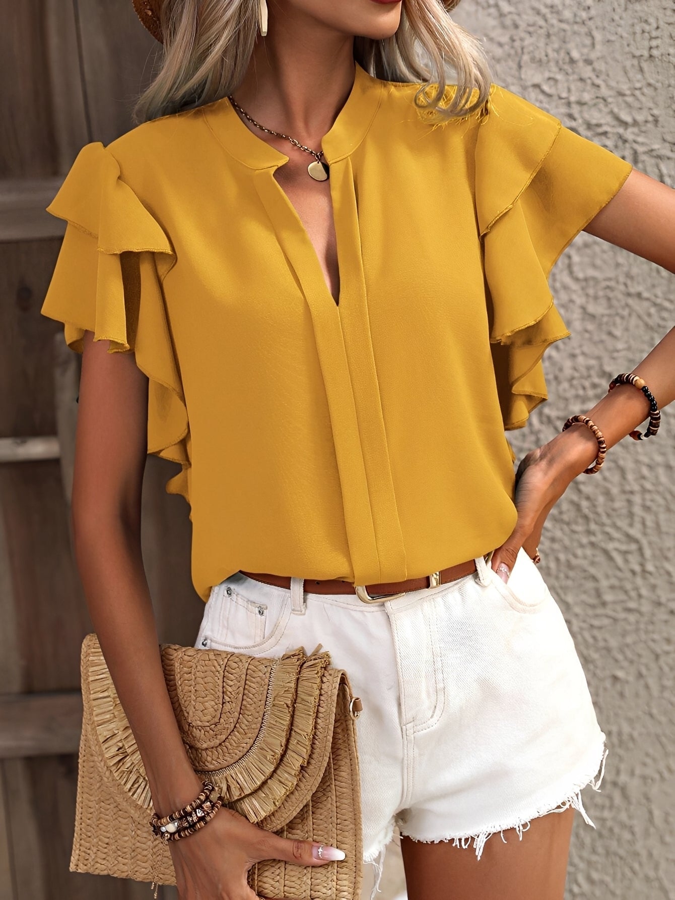 Louisa - Ärmellose Bluse mit V-Ausschnitt